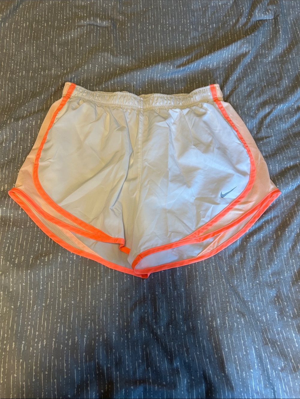 Nike Women's White Athletic Shorts with Neon Orange Trim